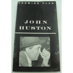 JOHN HUSTON premier plan...